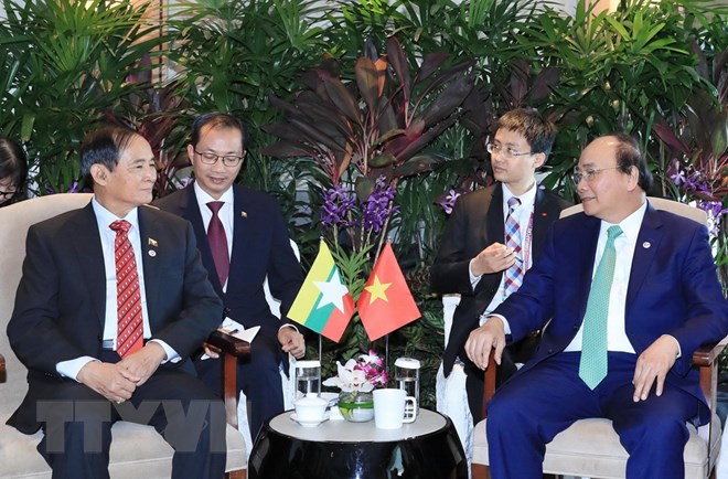 Thủ tướng Nguyễn Xuân Phúc hội kiến Tổng thống Indonesia Joko Widodo. (Ảnh: Thống Nhất/TTXVN)