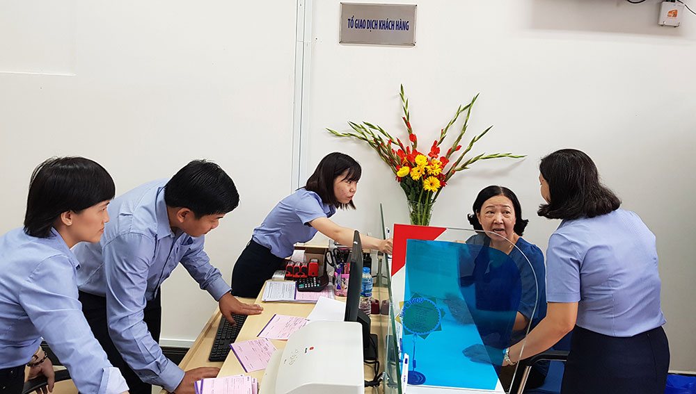 Customers come to trade at BIDV Tri Ton Transaction Office