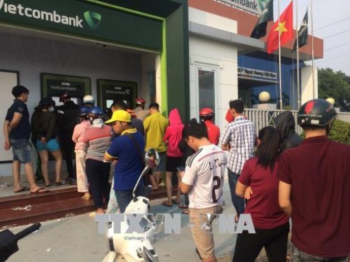Ngân hàng Nhà nước chưa cho phép các ngân hàng tăng phí rút tiền nội mạng