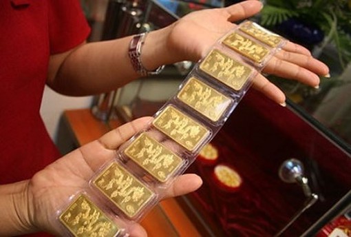 USD tăng nóng, vàng ảm đạm