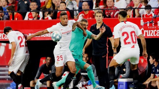 Benzema tỏa sáng, Real nhọc nhằn đánh bại Sevilla