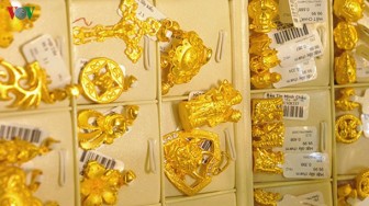 Giá vàng bật tăng tiến sát mốc 42 triệu đồng/lượng