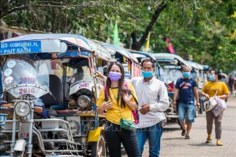Lào: Ấm áp tình người sẻ chia trong đại dịch COVID - 19