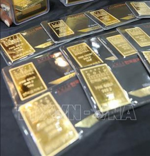 Triển vọng phục hồi không chắc chắn đẩy giá vàng thế giới đi lên phiên 19-5