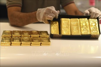 Giá vàng thế giới tăng 1% trong phiên 10-9