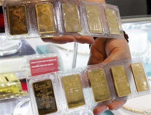 Giá vàng chịu áp lực lớn trước biến động của đồng USD