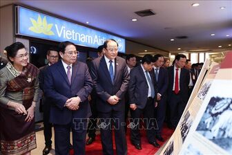 Thủ tướng Lào chiêu đãi Thủ tướng Phạm Minh Chính và đoàn cấp cao Việt Nam