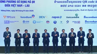 Công bố khuôn khổ thanh toán bản tệ và kết nối thanh toán bán lẻ song phương sử dụng mã QR Việt Nam-Lào